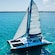 A sailing catamaran at sea